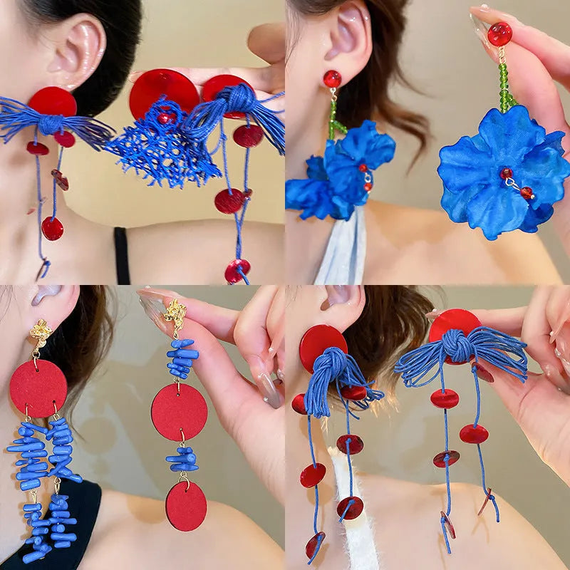 Women's geometric earrings with blue resin flower decoration and silver needle setting