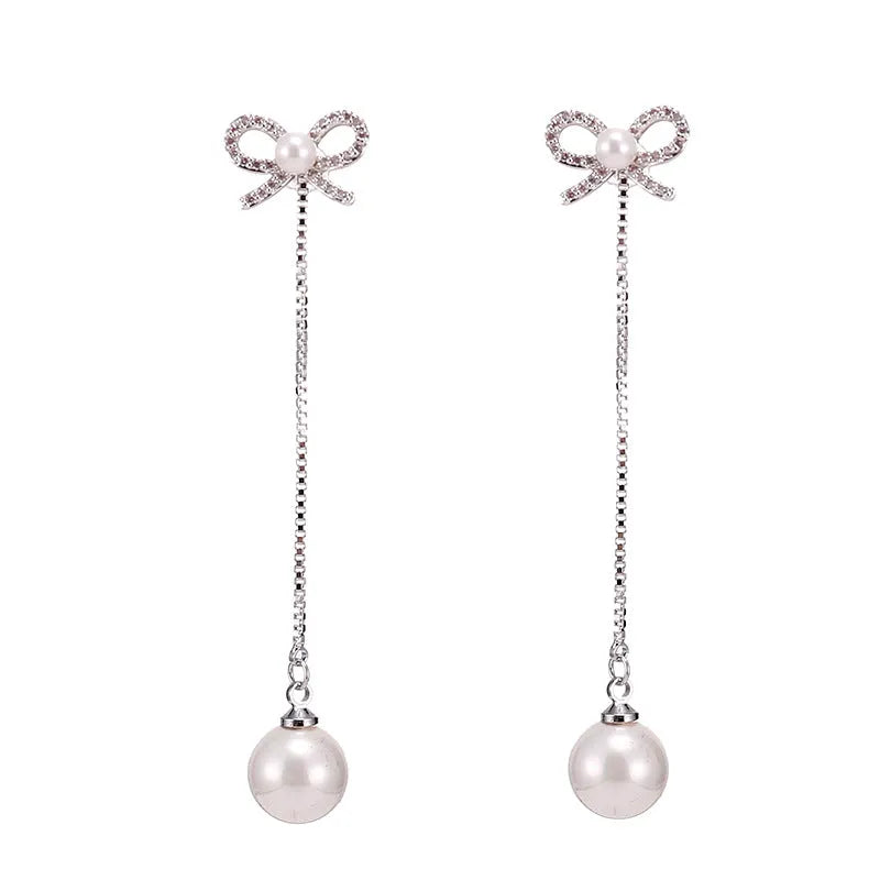 Sterling silver bow earrings with long pearl pendant, hypoallergenic copper construction, women's two-way style