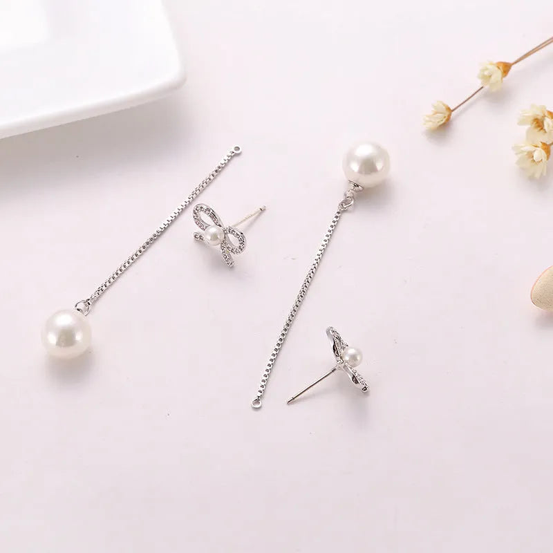 Sterling silver bow earrings with long pearl pendant, hypoallergenic copper construction, women's two-way style