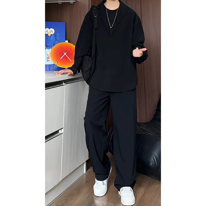 Men's black casual two-piece suit with long sleeve polo shirt and trousers on a hanger