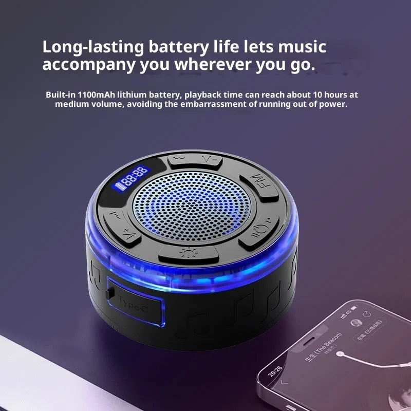 Mini waterproof Bluetooth speaker with suction cup in black for bathroom use