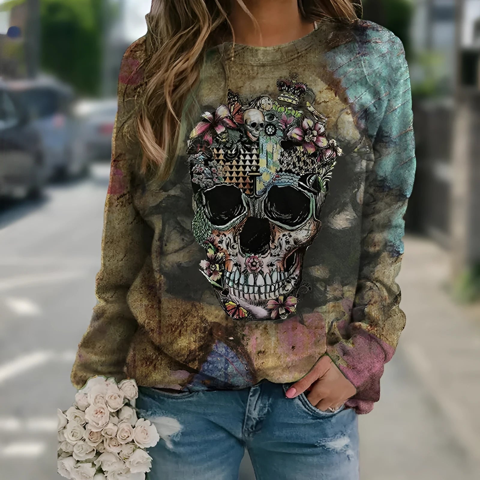 Black long sleeve sweatshirt featuring a skull graphic print on the front.