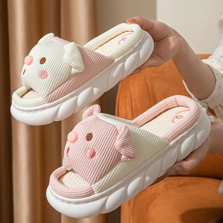 Piggy cute couple open toe linen slippers in pink colour on a white background.