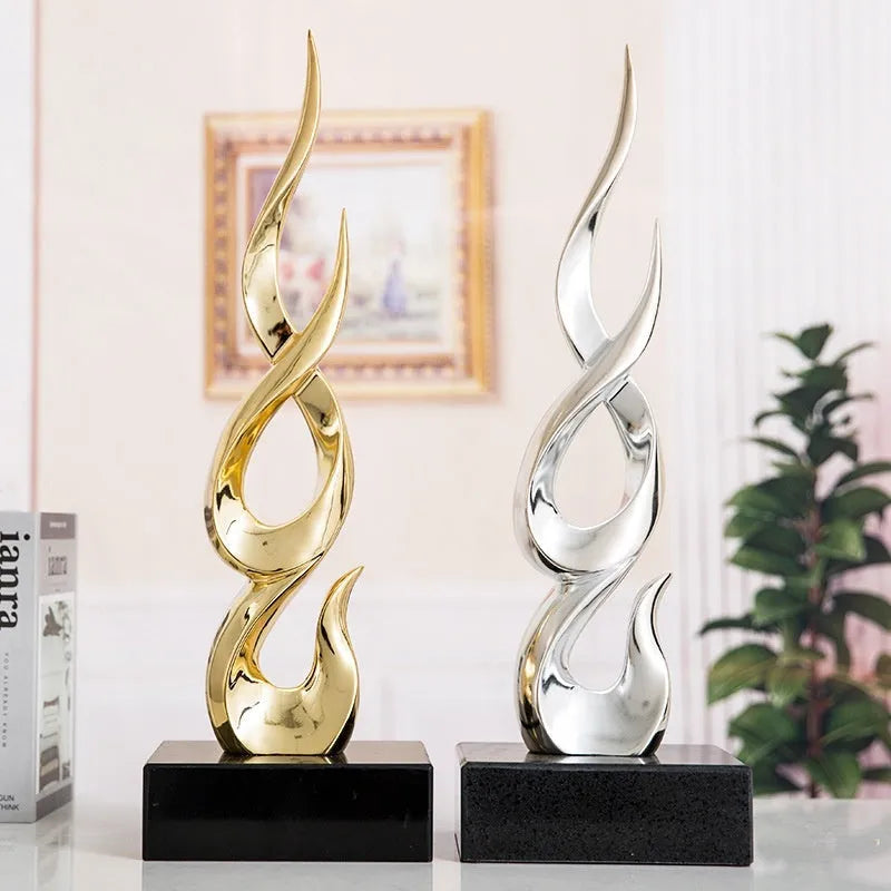Resin high-rise festival decoration ornament in bright gold colour with modern simple styling