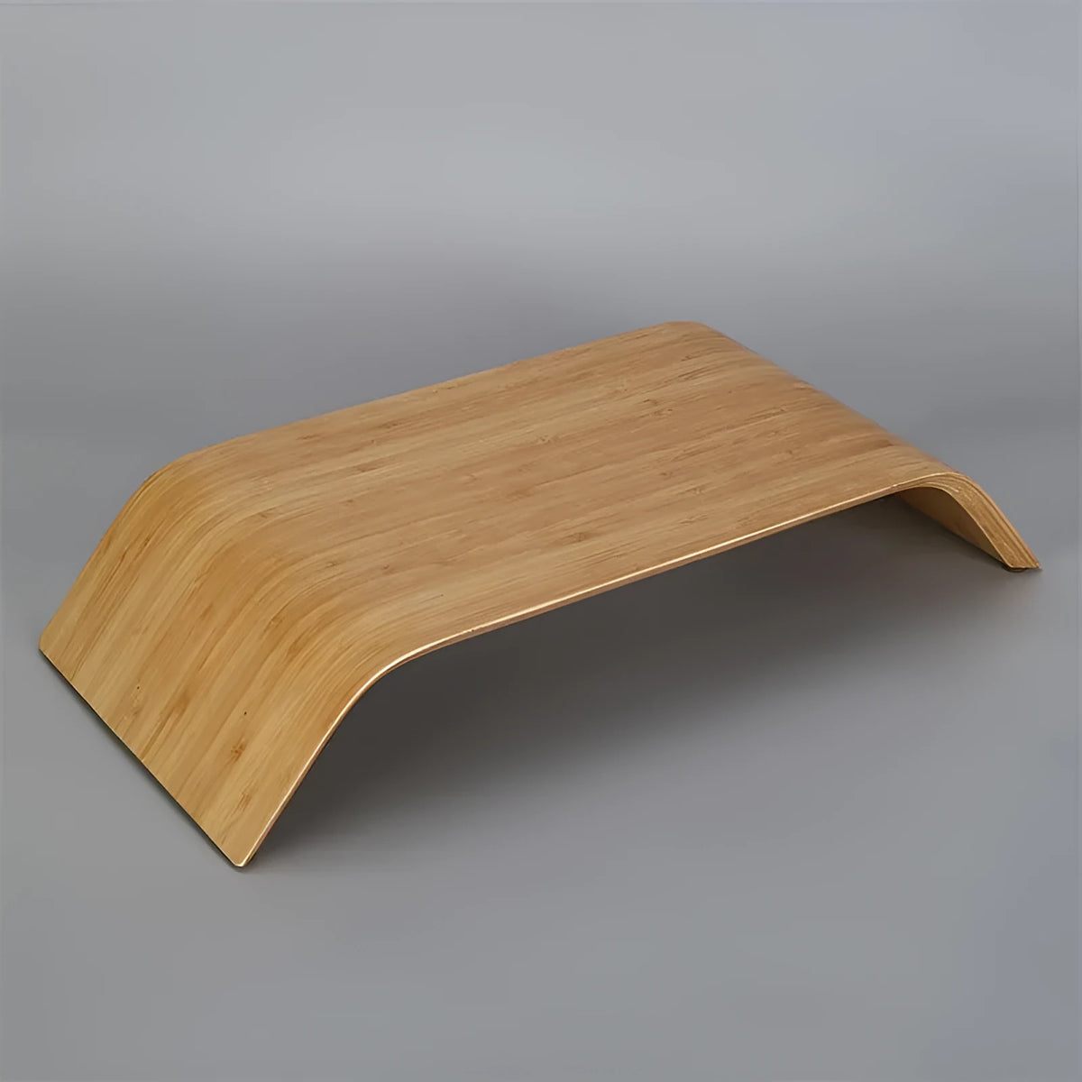 Walnut laptop stand with stability bracket in bamboo leather colour on a desk