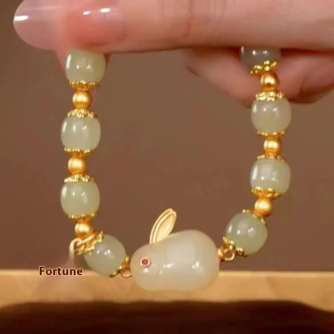 Green Chinese style jade hare bracelet for women with electroplating treatment and lily decorative elements