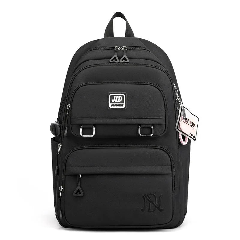 Girls' large capacity nylon school backpack in a selection of colours and graphic patterns on a physiological curve backplane.