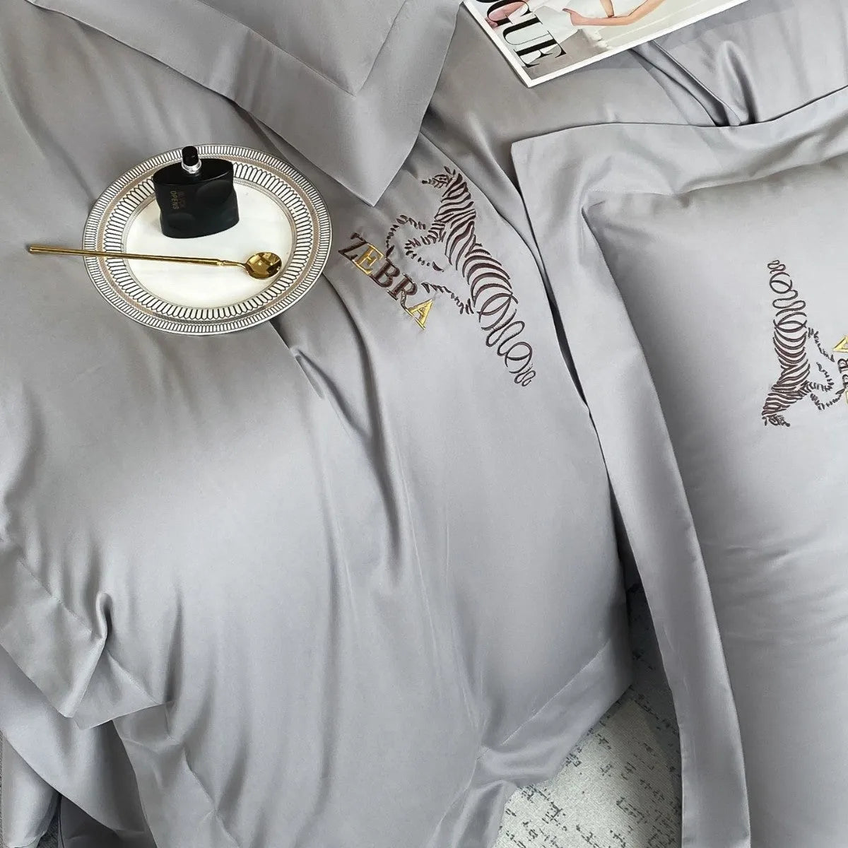Solid colour pure cotton four-piece bedding set with light brushed finish on a bed in a modern bedroom