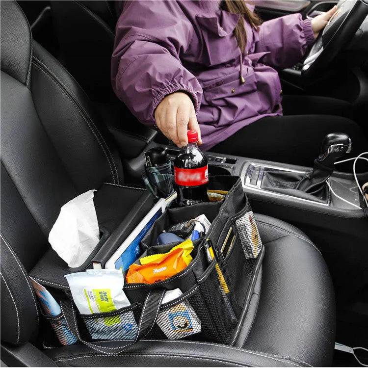 Black oxford cloth car trunk storage box with 33cm width and depth, 16cm height.