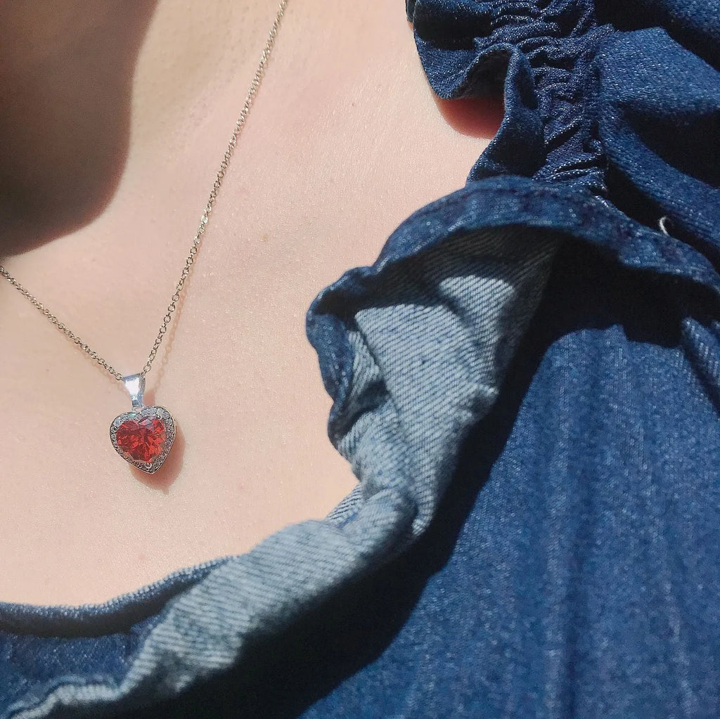 Orange copper diamond-processed pendant and cross chain earrings jewellery set