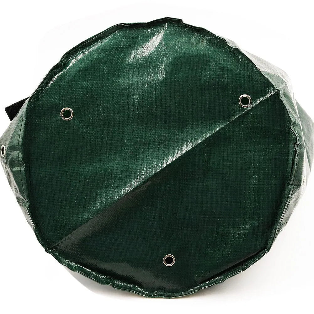 Dark green PE garden planting bag with side windows and double handles on a balcony