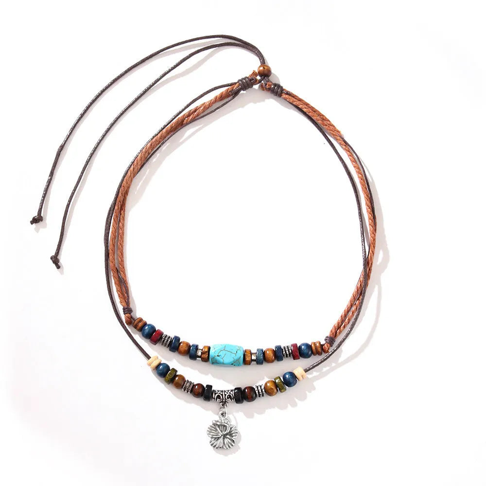 Turquoise wooden bead necklace for men with alloy geometric flower pendant on wax rope chain