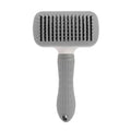 Self-cleaning pet comb with fine needle stainless steel teeth, rubber body, 19 cm, in blue, pink, or grey