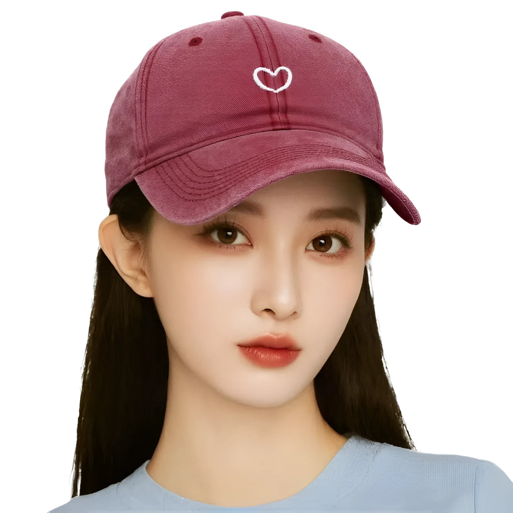 Soft cotton embroidered baseball cap with adjustable strap on a neutral background.