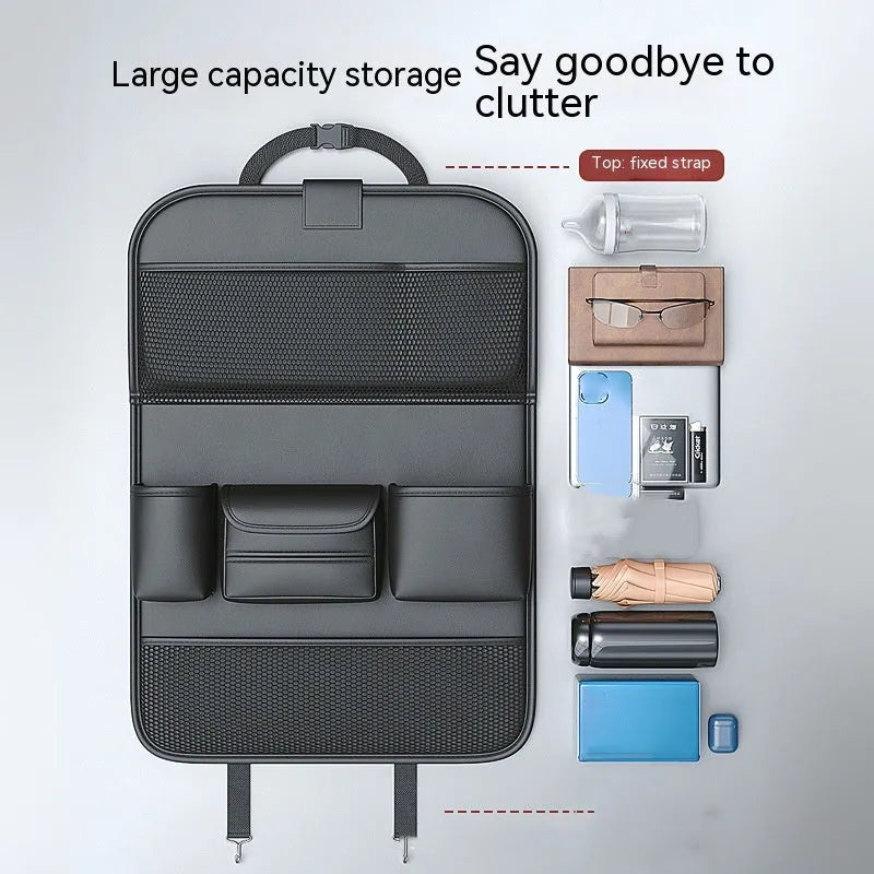 Car seat storage bag with foldable table in leather, hanging behind vehicle seat