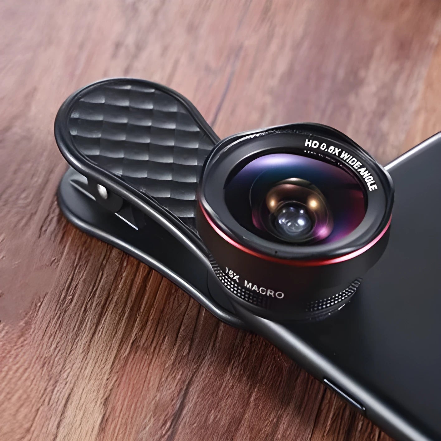 Mobile phone external camera lens kit showing wide-angle and macro lenses with clip and storage box in black finish