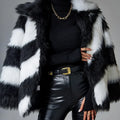 Women's faux fur coat with contrast colour lapel and a matching fur collar.