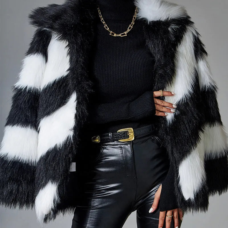 Women's faux fur coat with contrast colour lapel and a matching fur collar.