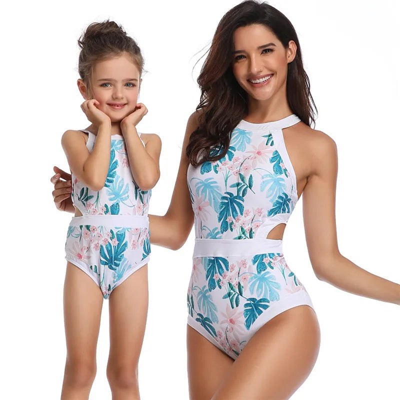 Women's blue nylon swimsuit with Japanese floral pattern, front view