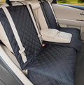 Black pet car seat cover made from 600D Oxford cloth with thick cushion and non-slip net on a rear car seat
