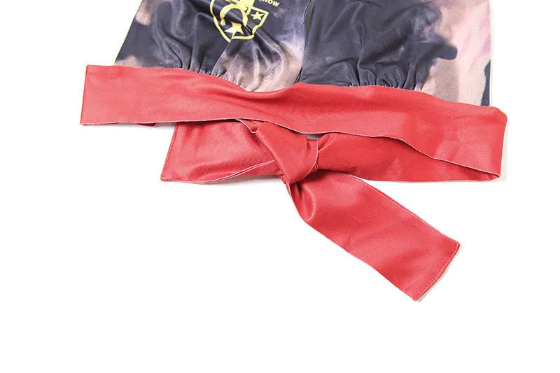 Red women's high waist hip lift shorts and bikini top set with 3D printed pattern.