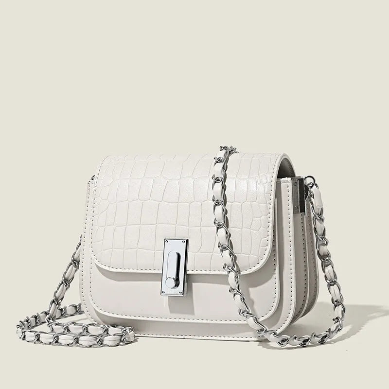 Women's soft black PU leather chain shoulder bag with a square shape and sandwich pocket.