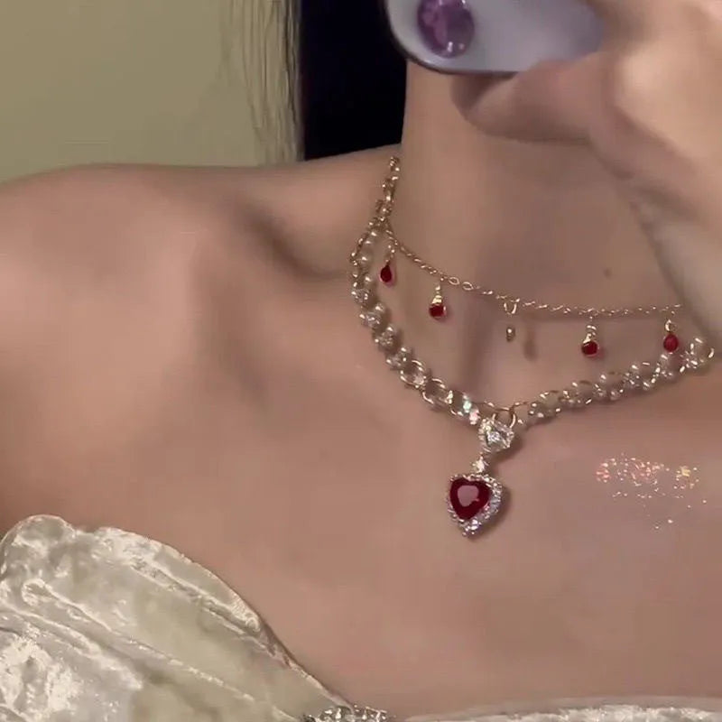 Red love heart double layer twin necklace on a regular chain, adjustable from 41cm to 50cm.