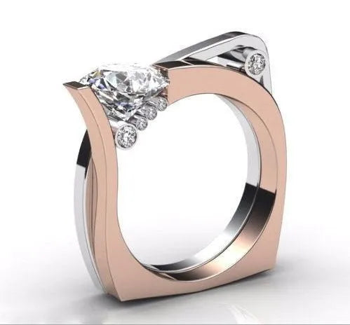Rose gold geometric women's ring with inlaid zircon stones on a grey background.