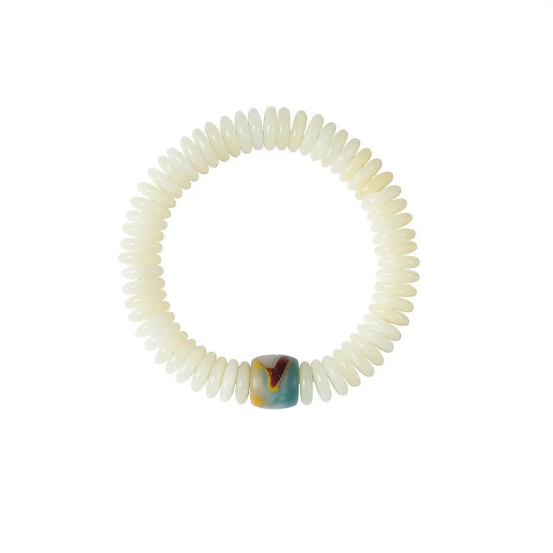 White Bodhi bead bracelet with 3 × 10mm beads in Tibetan style