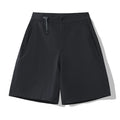 Man wearing khaki quick-drying sports shorts with a 3D cut, suitable for running.