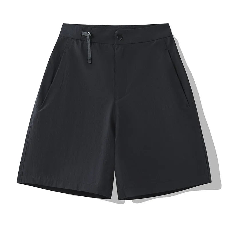 Man wearing khaki quick-drying sports shorts with a 3D cut, suitable for running.