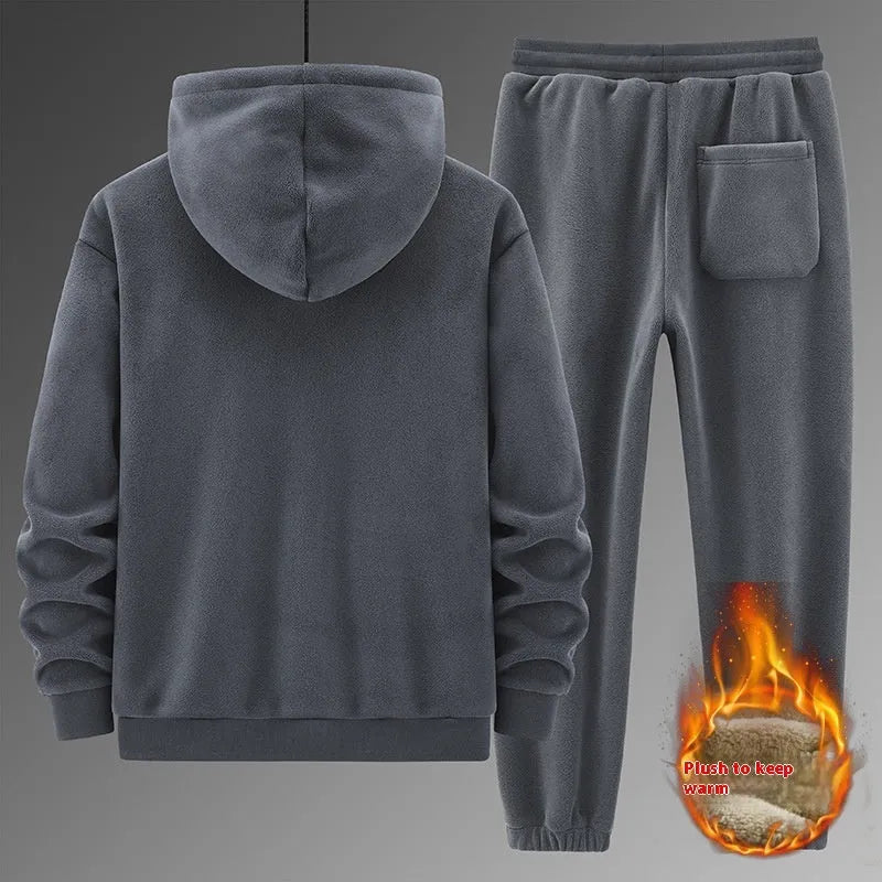 Men's grey cashmere hooded sweater and cotton pants casual sports suit set laid flat.