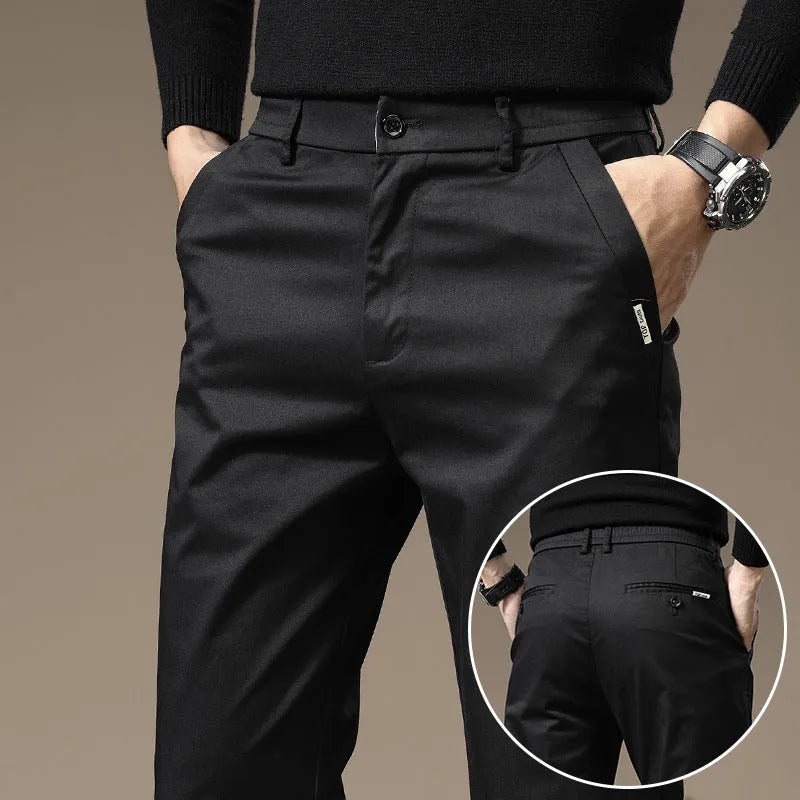 Men combed cotton light business casual trousers in black, side view showing mid-waist cut and fabric texture