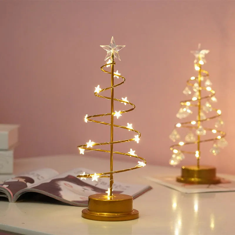 Gold crystal Christmas tree LED light with warm glow, star topper, 33cm tall, on a tabletop