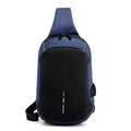 Small dark blue oxford cloth chest bag with a zipper and adjustable strap, showing internal phone pocket.