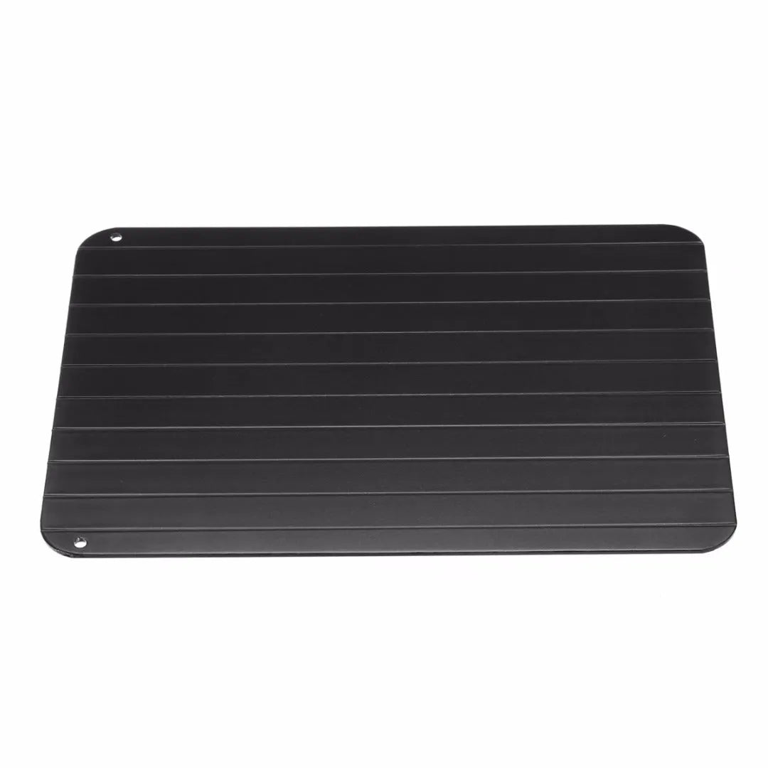 Black aluminium quick defrosting tray for thawing frozen meat and food without electricity.