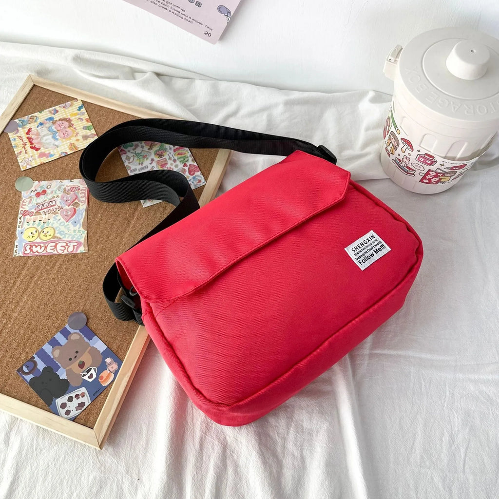 Oxford cloth crossbody messenger bag in solid colour for women and men with flap closure