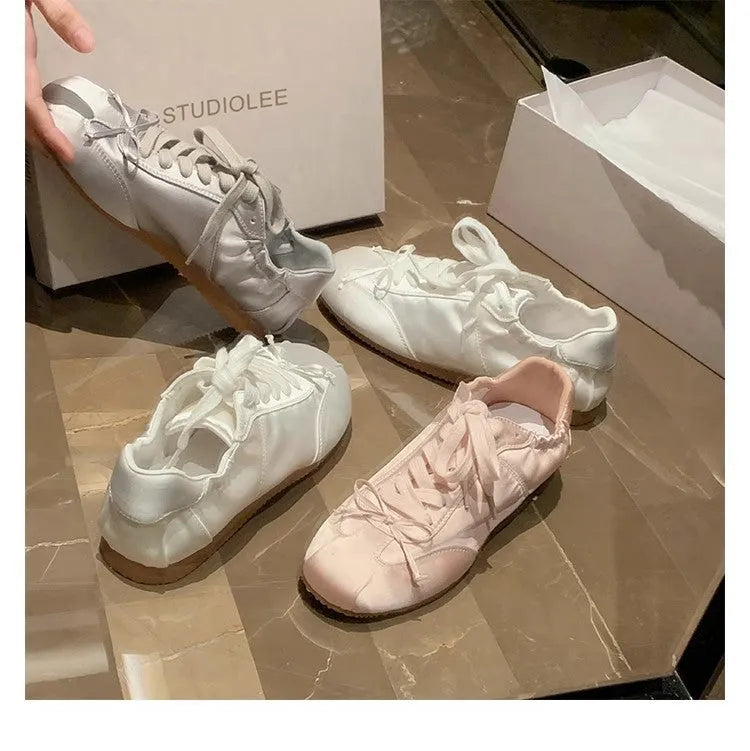 Women's satin ballet flats with round toe and lace-up closure in silver grey, pearl white and champagne pink colours