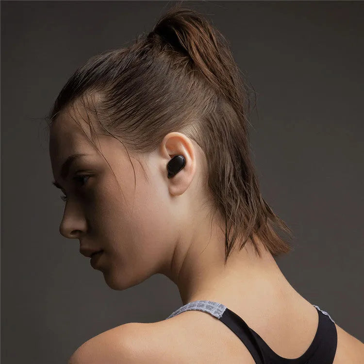 Redmi AirDots 2 black true wireless earbuds and charging case on a white background