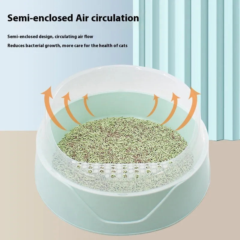 Round hooded cat litter box in mint green colour with deodorising function for indoor feline hygiene