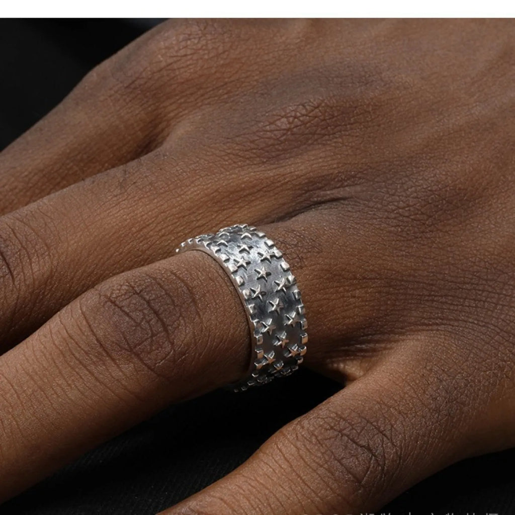 Adjustable silver ring with geometric five-pointed star pattern