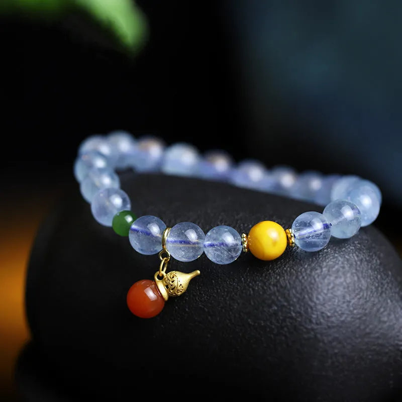 Iced aquamarine crystal bracelet with 8mm geometric beads and ethnic retro styling