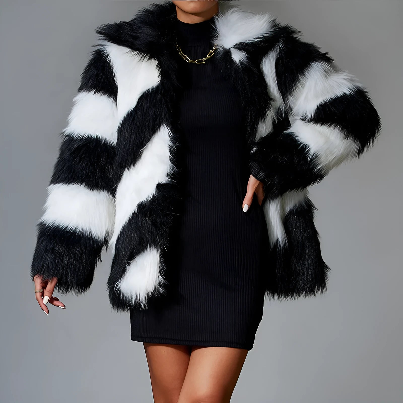 Women's faux fur coat with contrast colour lapel and a matching fur collar.