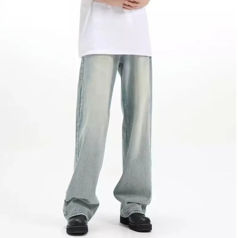 Blue loose-fit retro casual trousers with an elasticated waistband on a neutral background.