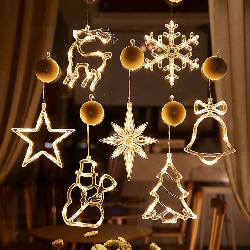 Battery-powered Christmas LED chandelier light with suction cups, showing Santa Claus design.