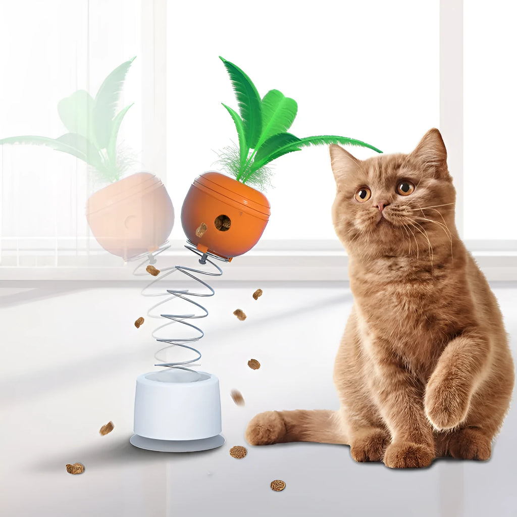 Carrot-shaped cat leaking food toy tumbler on floor, 6.3x6.3x9cm, made of ABS plastic