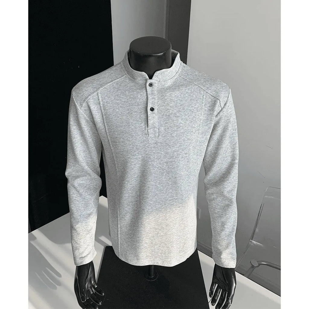 Men's grey asymmetric polo shirt with a patchwork stand-up collar and long sleeves.