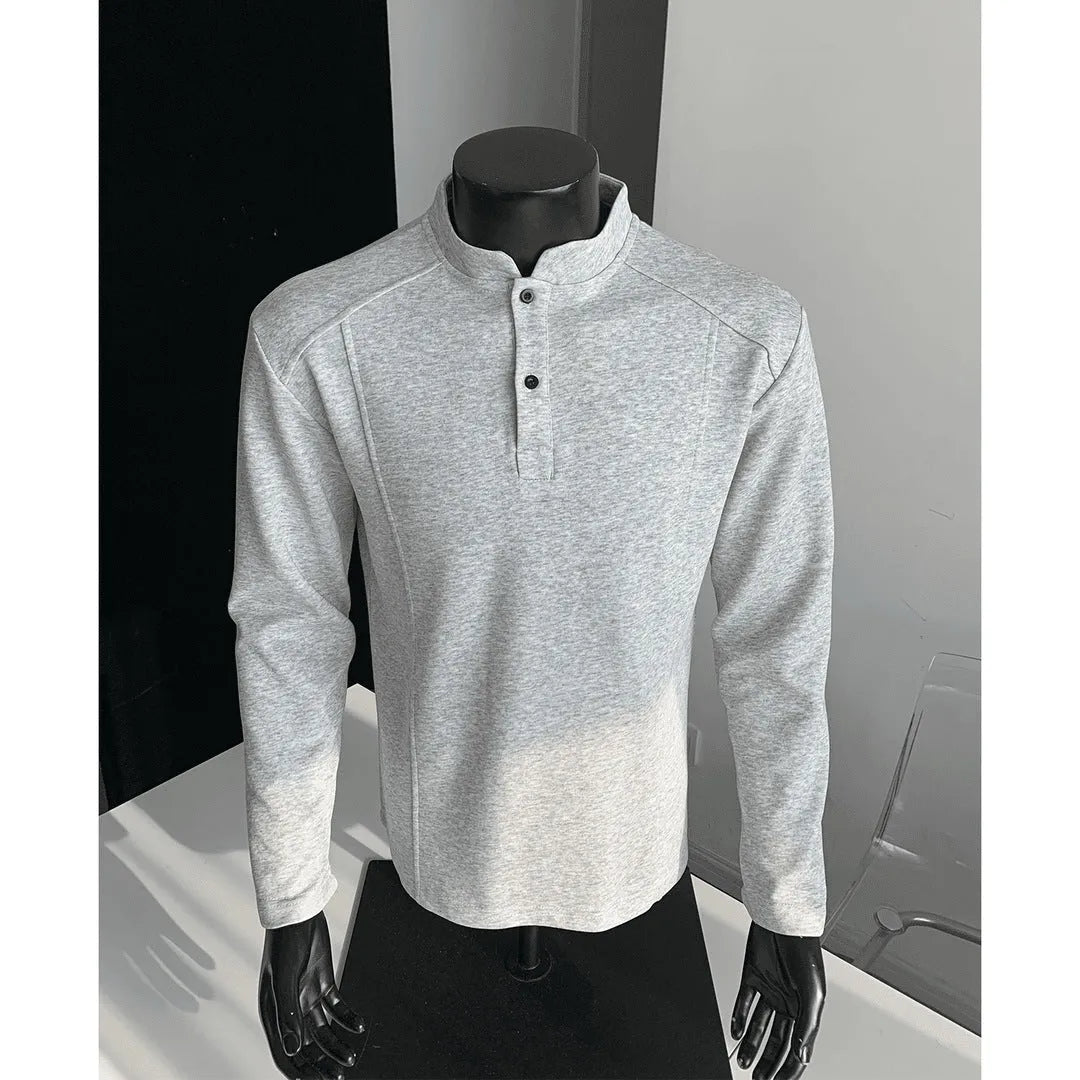 Men's grey asymmetric polo shirt with a patchwork stand-up collar and long sleeves.