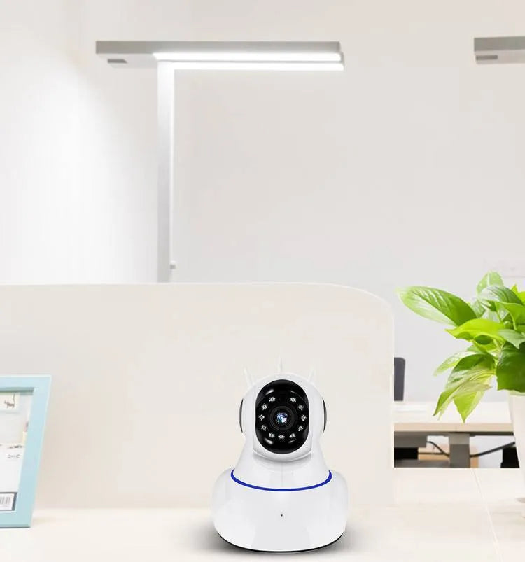 White dome-shaped wireless network security camera with a 3.6mm lens.