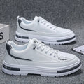 Men's white and black Korean style low-top platform sneakers with elastic band and round toe.